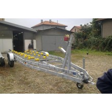 Trailer with breaking system