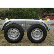 Trailer with breaking system